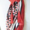 Bold patterned silk scarf with tassels