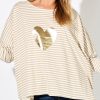 Striped top in bamboo and white with large gold heart motif on the front
