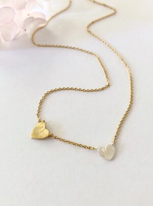 Gold chain with gold and silver hearts