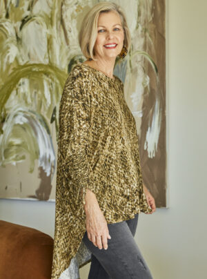 Loos fitting top with ruched sleeves in snakeskin pattern