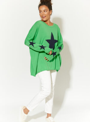 Bright green knit jumper with navy blue stars on the front and smaller stars on the sleeves
