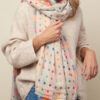 cream scarf with colourful dots on one side and checks on the other