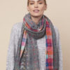grey scarf with coloured hearts and checks on the reverse side