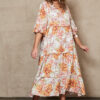 Tiered floral dress with white background