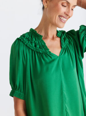 Emerald green top with gathered frill neckline