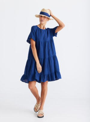 Blue tiered linen dress with round neck and frill sleeves