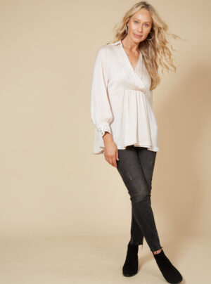 Silky soft cream blouse with v neck and pleat front