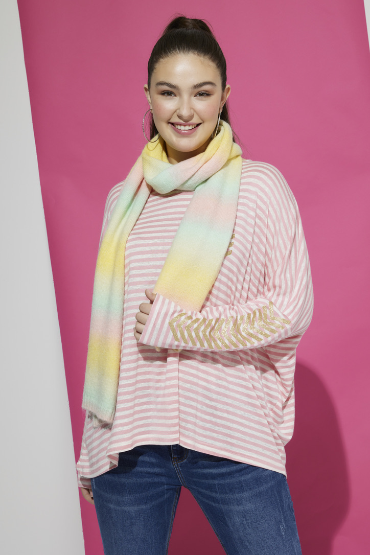 girl wearing a scarf in pastel colours